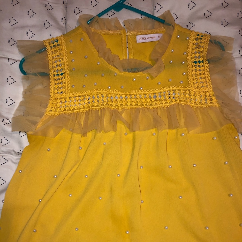 A loose blouse worn once